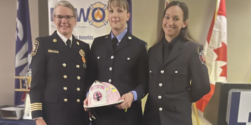 Firefighter Lee-Ann Stam receives the 2023 Pink Helmet of Courage Award.